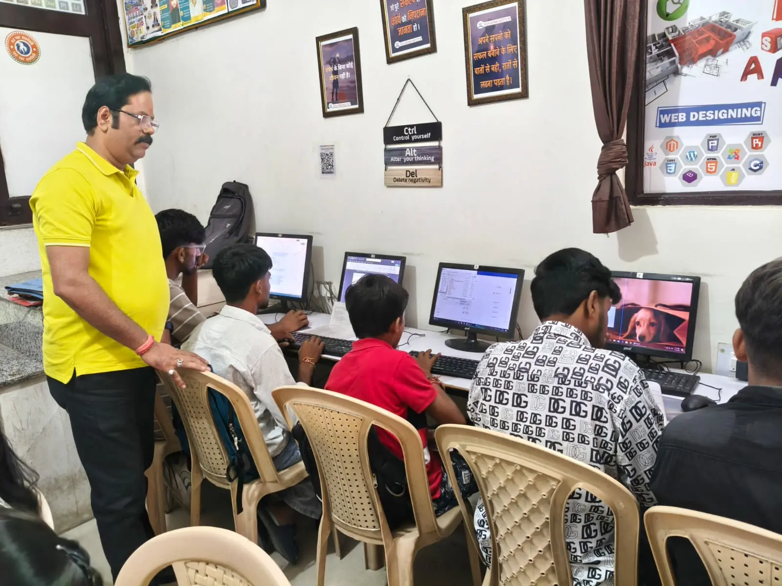 Students learning computers in lab